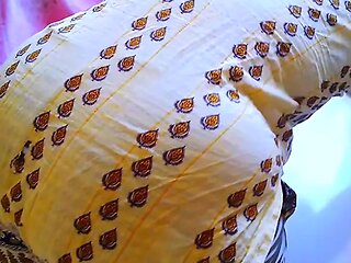 Indian Muslim Bhabhi gets stuck under the bed while cleaning the house then the neighbor helps her by fucking her in the ass