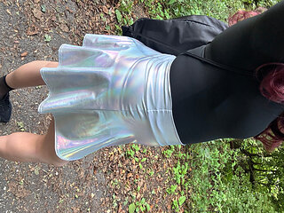 Sissy in miniskirt and chastity with big dildo outdoor