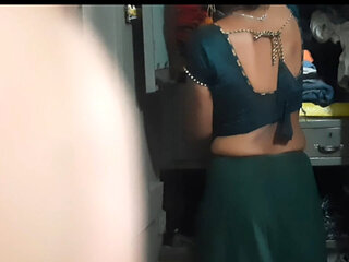 18-year-old desi Indian village's beautiful sister-in-law is showing off her all by opening a petticoat blouse.