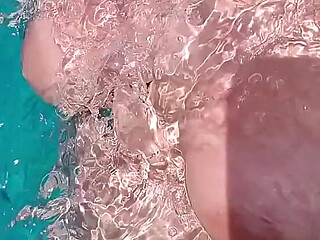 Swimming in the blue waters of Greece butt naked...