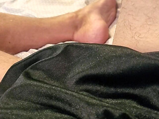 Masterbating in black nylon panties.