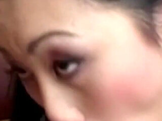 An Asian Female Engages in Self-stimulation While Anticipating Engaging in Intense Anal Intercourse in the Doggie Style Posture.