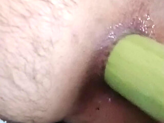 Hairy Turkish boy satisfies himself with big cucumber