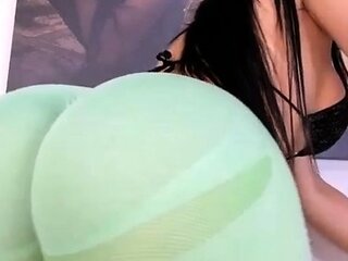 Brunette seductress working her big boobs and hot ass